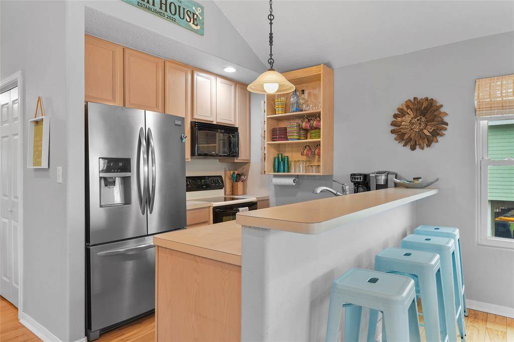 Looking towards the kitchen .