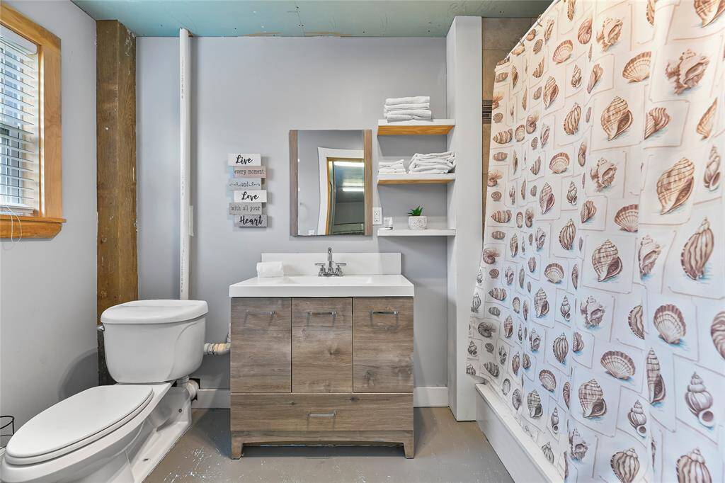 You have a third full bath located in the bunk room with a shower.
