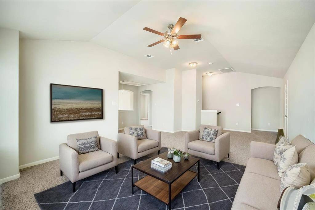 Make memories in this spacious game room, ideal for entertaining, working from home, or relaxing with family. The open layout, vaulted ceiling, and plush carpeting create a comfortable and inviting atmosphere. Whether it’s a home theater, play area, or lounge, the options are limitless!