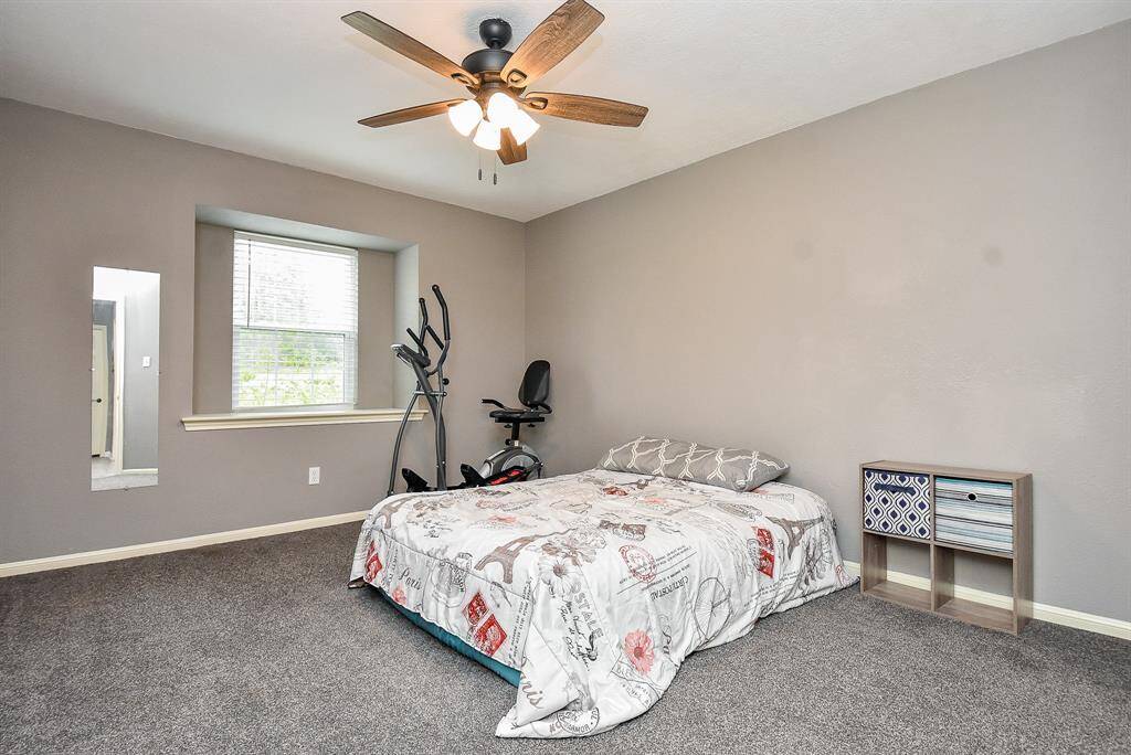 This is your personal place of peace and repose: your lushly carpeted, bright primary suite.