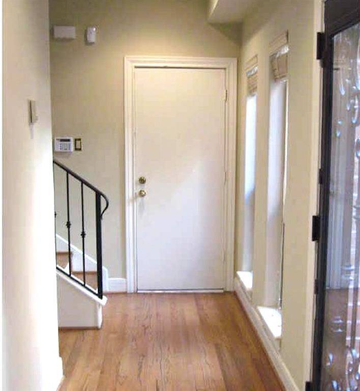 Enter directly to the hallway from the attached two car garage.
