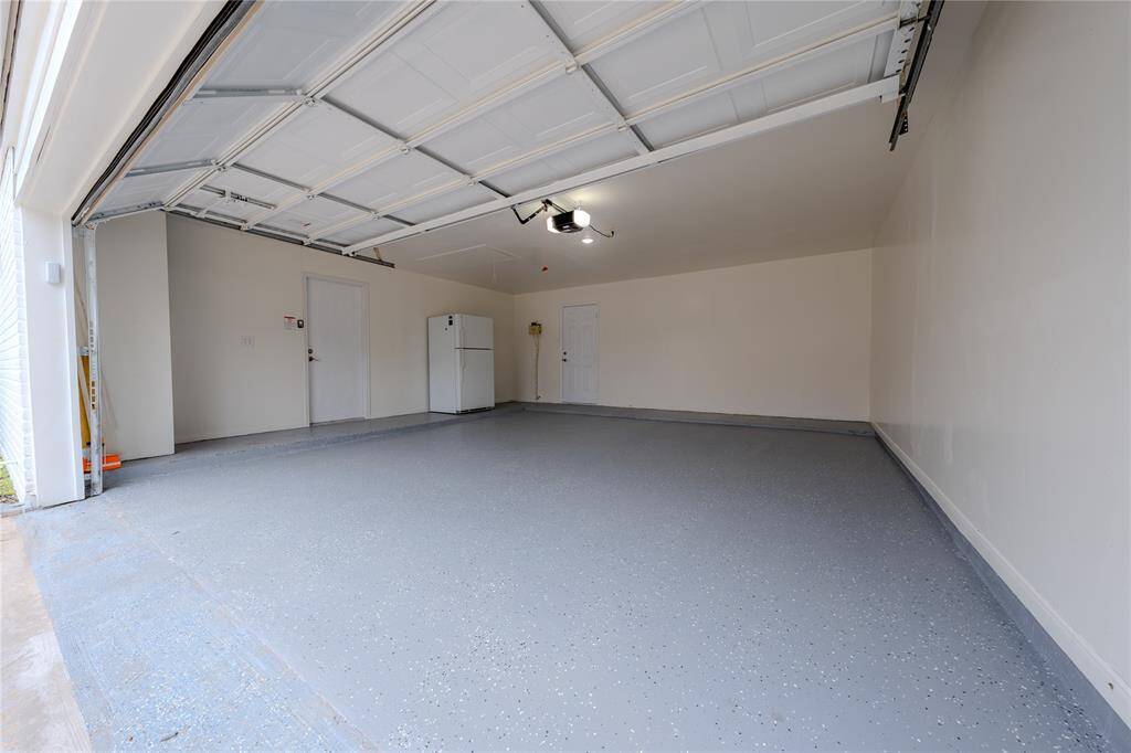 Imagine pulling into your two-car garage. This space is not just for parking but also for storing your tools, gear, and other essentials.