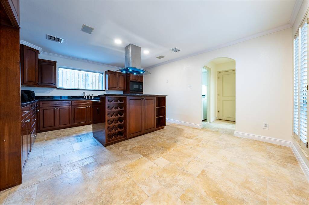 Equipped with efficient cooktop, refrigerator, microwave, stove, built-in wine rack and plenty of storage cabinets, you'll have everything you need at your fingertips for delightful cooking experiences. This Kitchen is a joy to use.