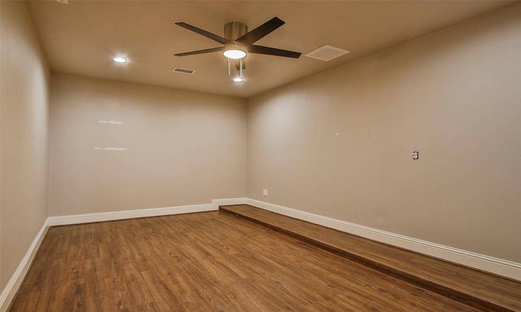 Converted garage features a large Flex Room that could be used as a gameroom, another bedroom, office, playroom, etc.
