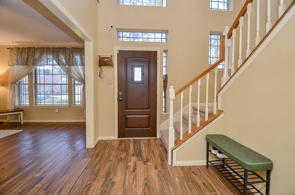 FRONT ENTRY WAY WITH MULTIPLE WINDOWS