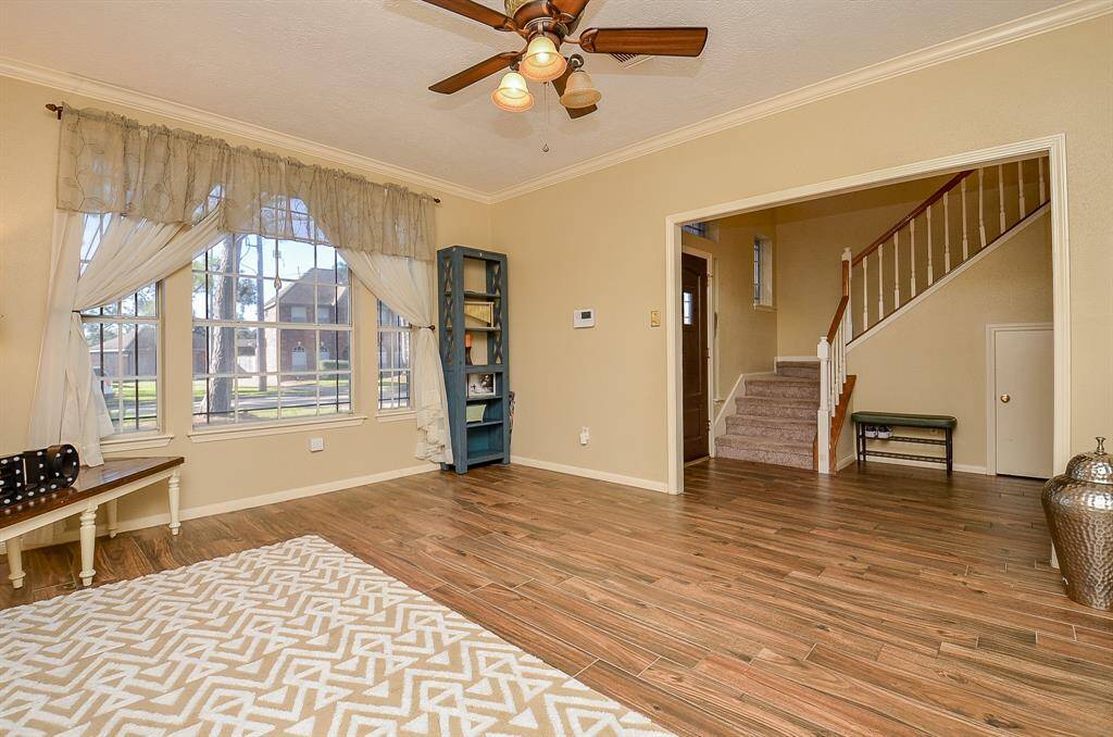 NOTICE THE DOOR UNDER THE STAIRS FOR ADDITIONAL STORAGE