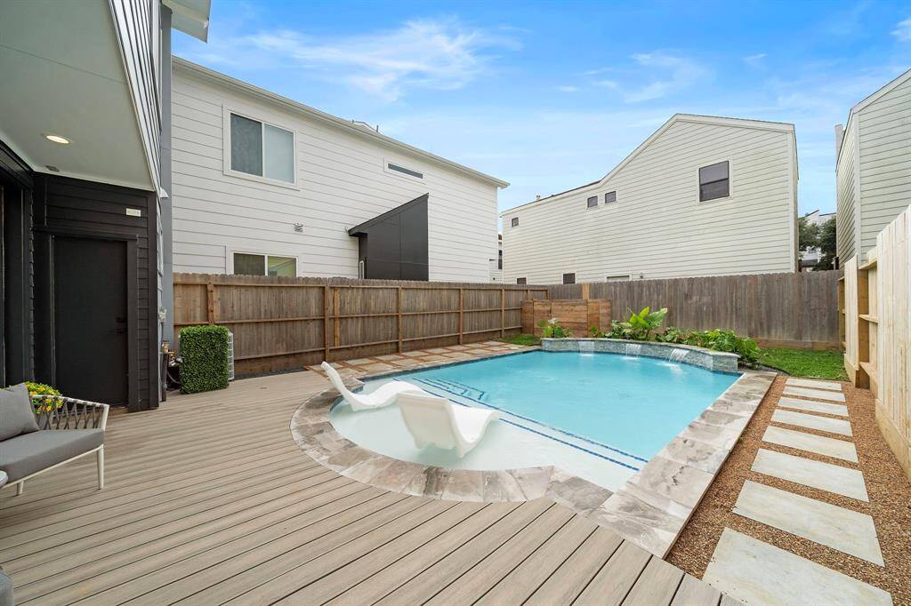 Enjoy this summer with outdoor living and a crystal clear pool, all within the comfort of your own home in the Museum District.