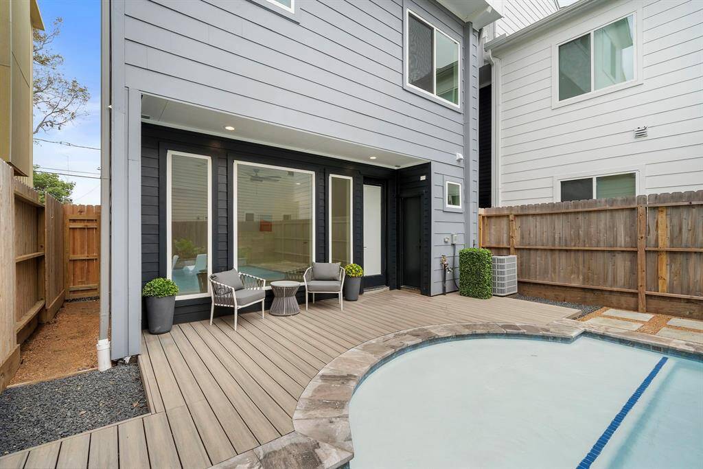 This beautiful patio offers stunning pool views.