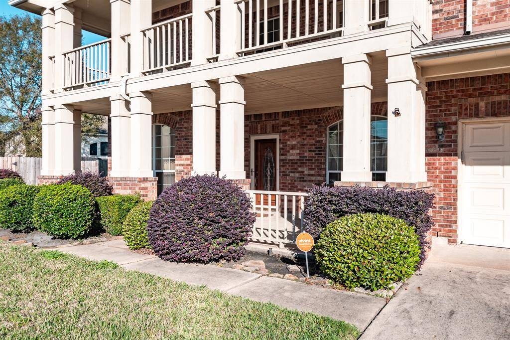 Oversized covered porch Up and downstairs