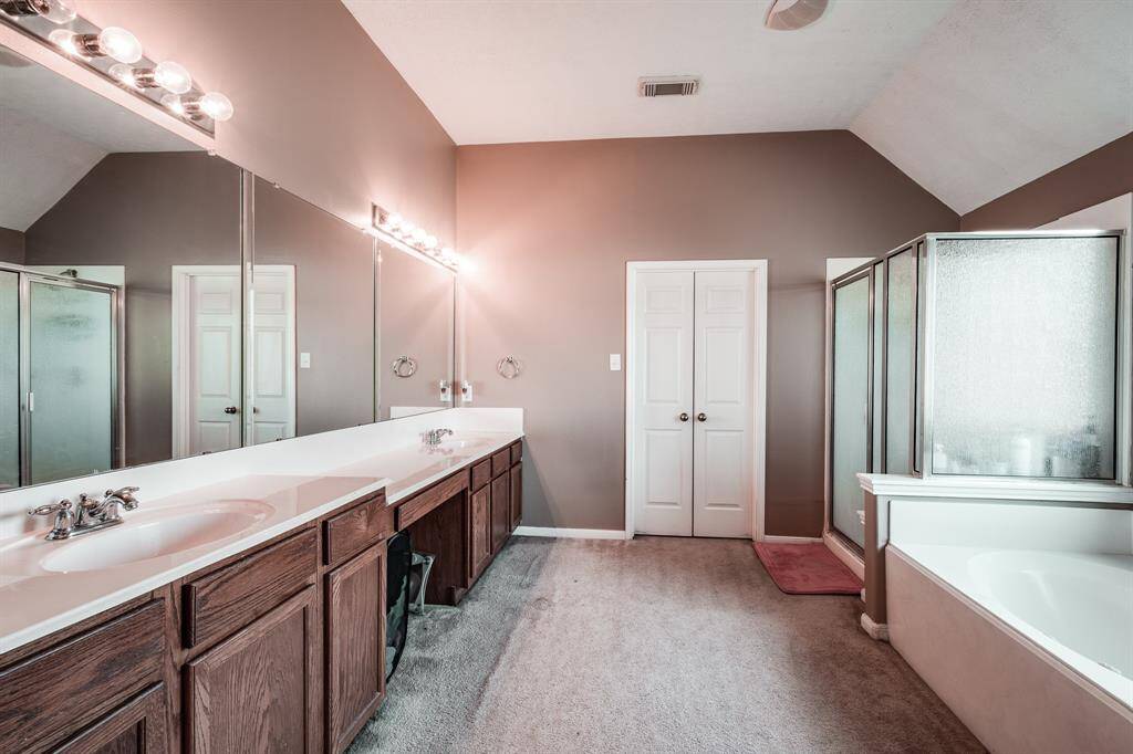 upstairs 2nd primary bathroom with double vanities