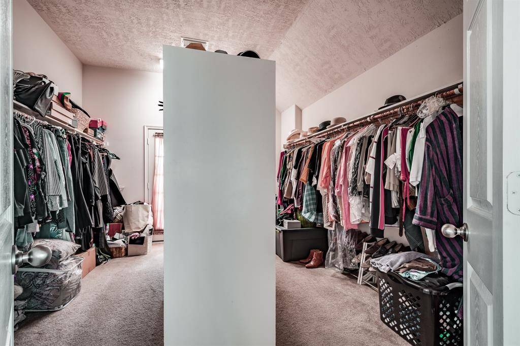 Look at this amazing closet in 2nd primary room. Closet opens to upstairs covered porch.