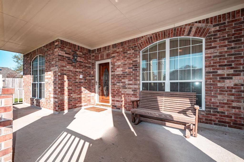 Enjoy your morning coffee on this fantastic covered porch