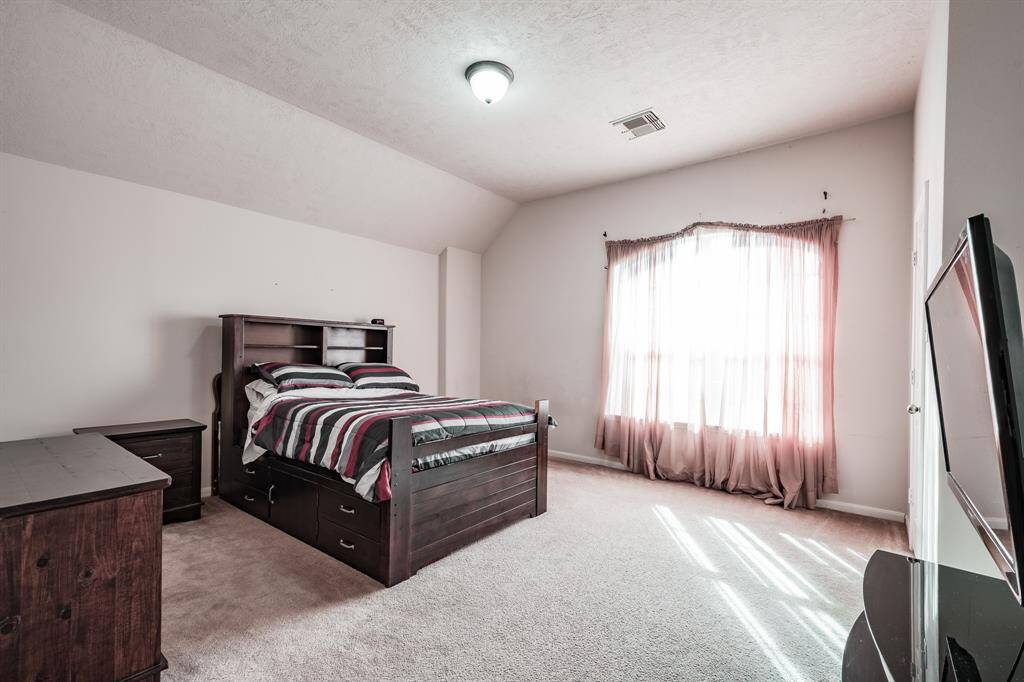 Another spacious secondary bedroom with walk-in closet
