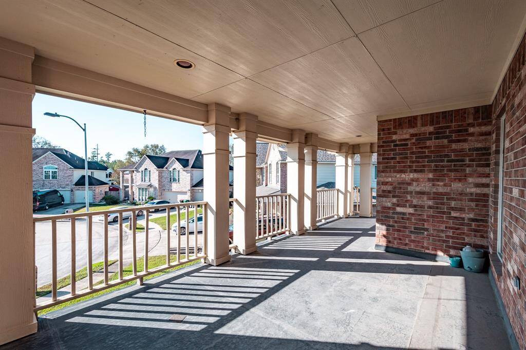 Look at this oversized covered porch upstairs
