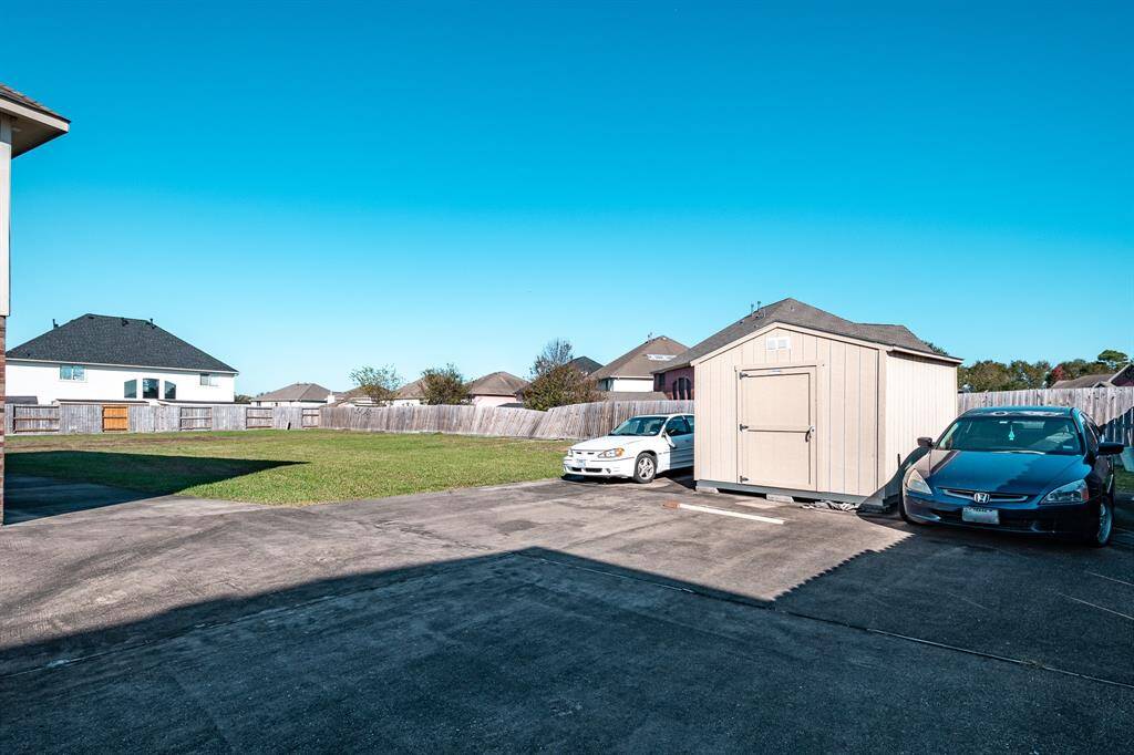 Additional parking in backyard.