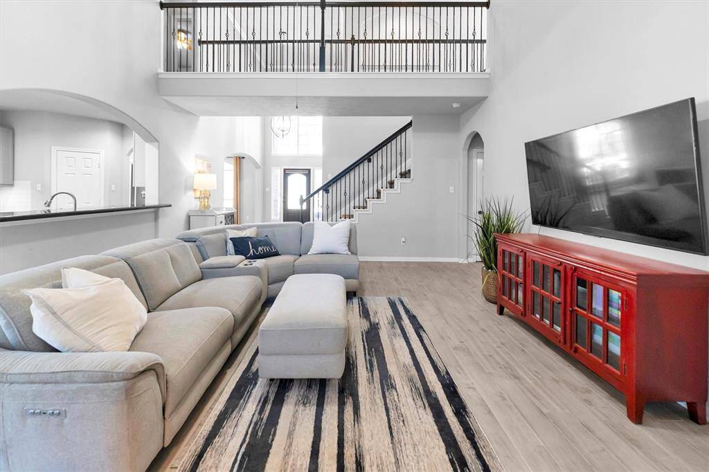 Alternate view of den/family room, looking into the entry. Spacious and bright!