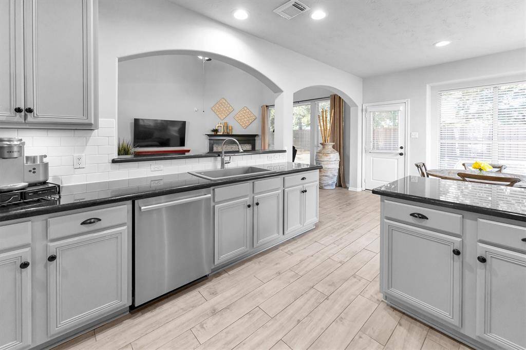 Delightful Kitchen with plenty of counter space to prep or serve your meals