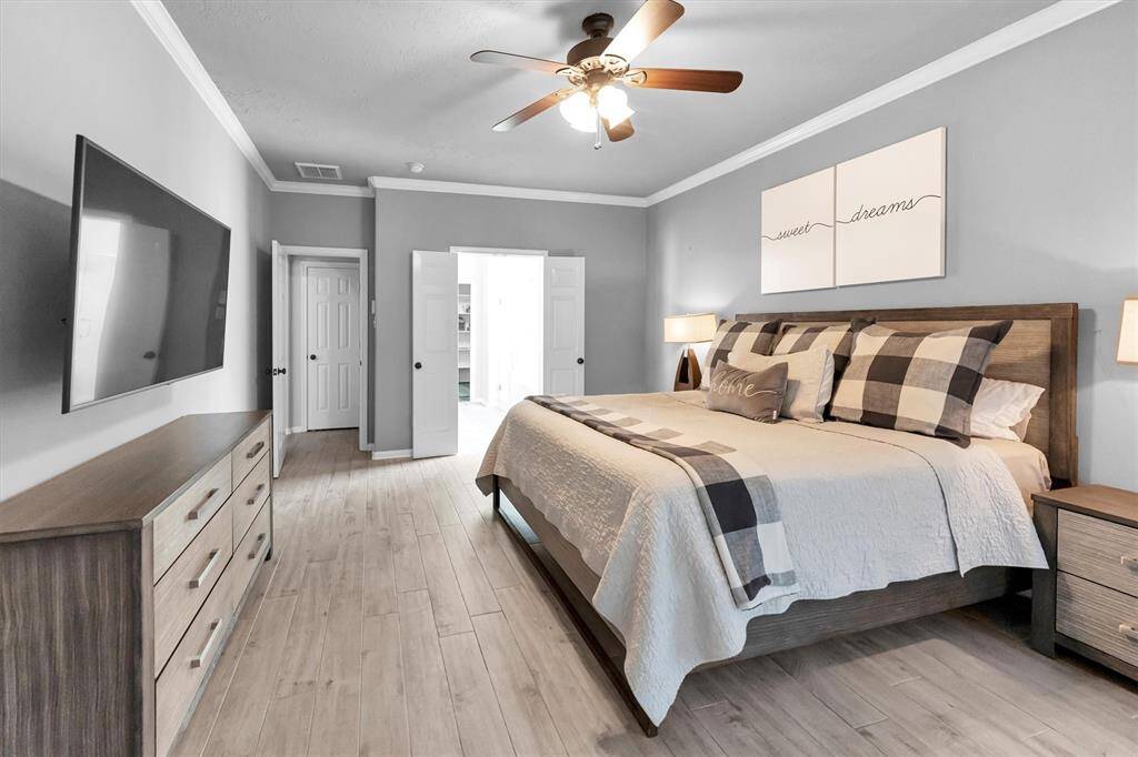 Primary bedroom leading into primary bathroom and Large walk in Closet