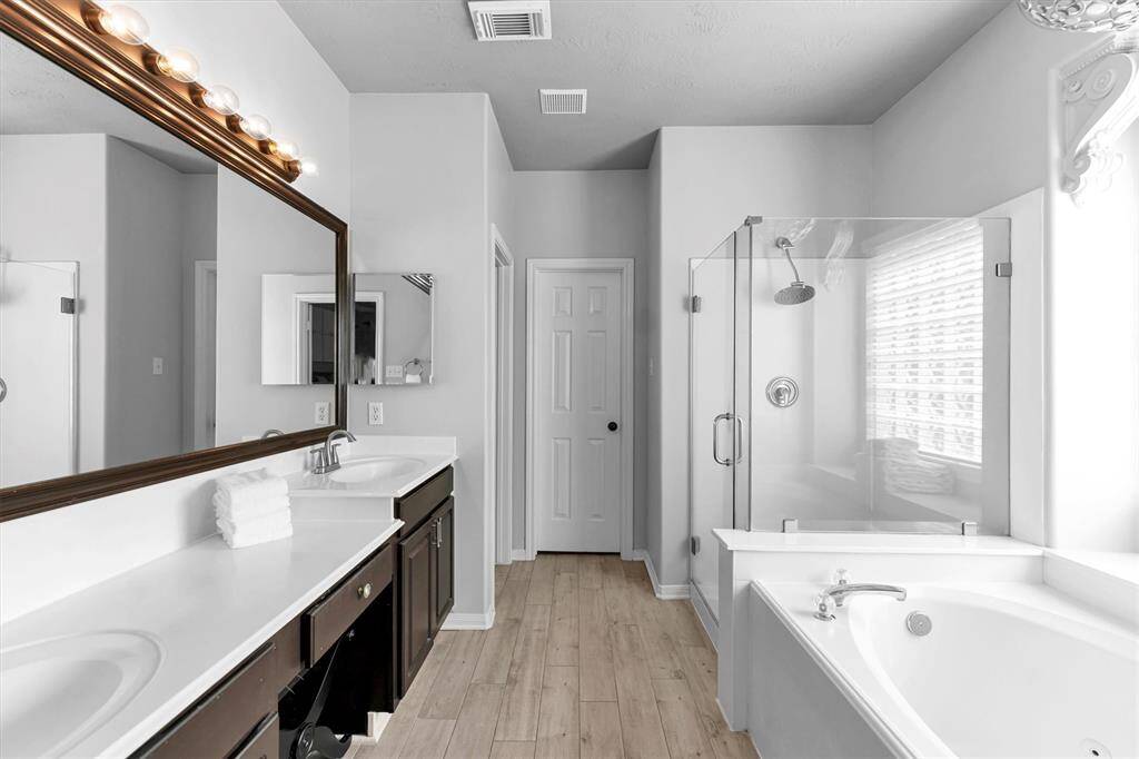 Dual vanities make getting ready a breeze! And the soaking tub is like having a spa in your own home!