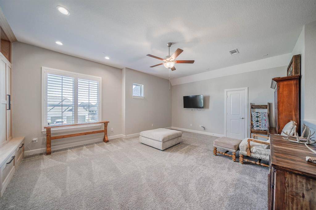 Upstairs loft with entry to 2nd additional walk in attic space. Also, prewired for surround sound!
