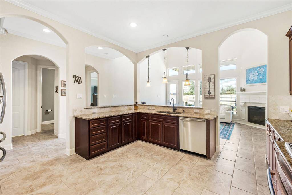 The Heart of the Home (and Your Coffee Addiction) – Whether you’re hosting friends or sipping your fifth cup of coffee in peace, this kitchen has the perfect blend of beauty, comfort, and "I’m not sure how I survived without this" functionality.