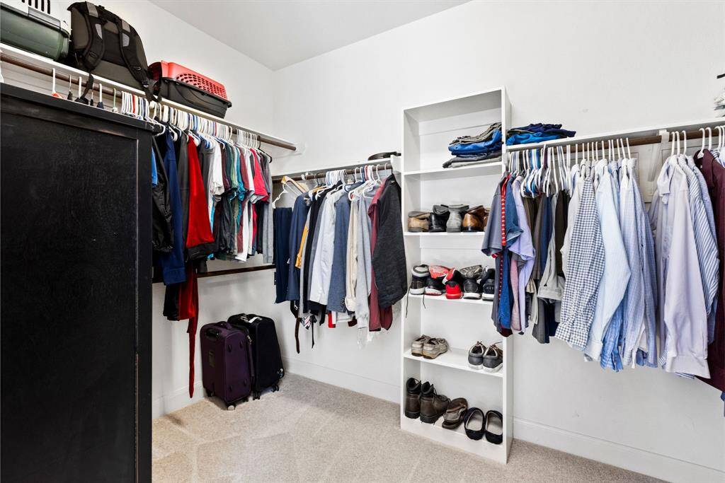 His Space, His Rules – Welcome to the man cave of closets—where suits, sneakers, and the occasional random t-shirt rule the roost. It's all his, so if you’re looking for space, just ask him nicely.