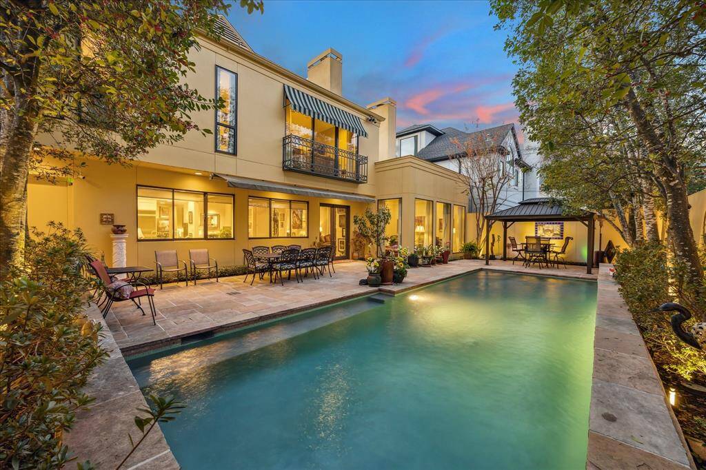 This magazine worthy backyard features a heated pool to enjoy all year around. It has also been professionally landscaped by Prewett Read & Associates.