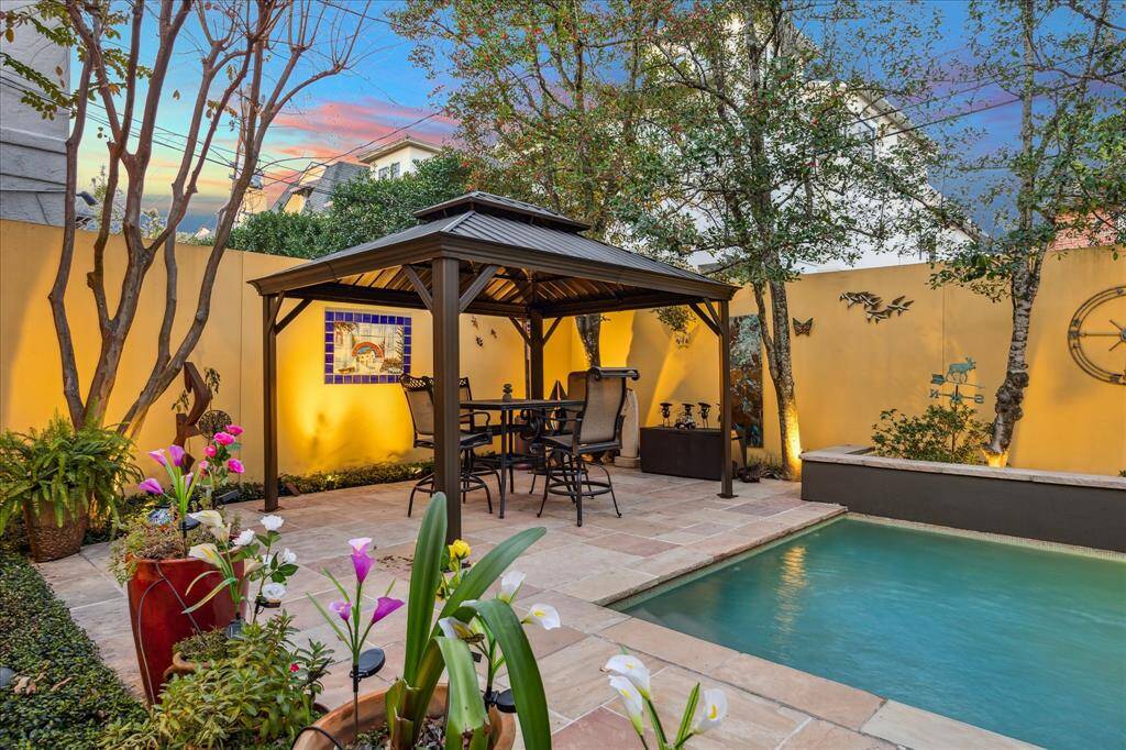 The custom covered cabana has been recently installed and is a great addition to the yard space.