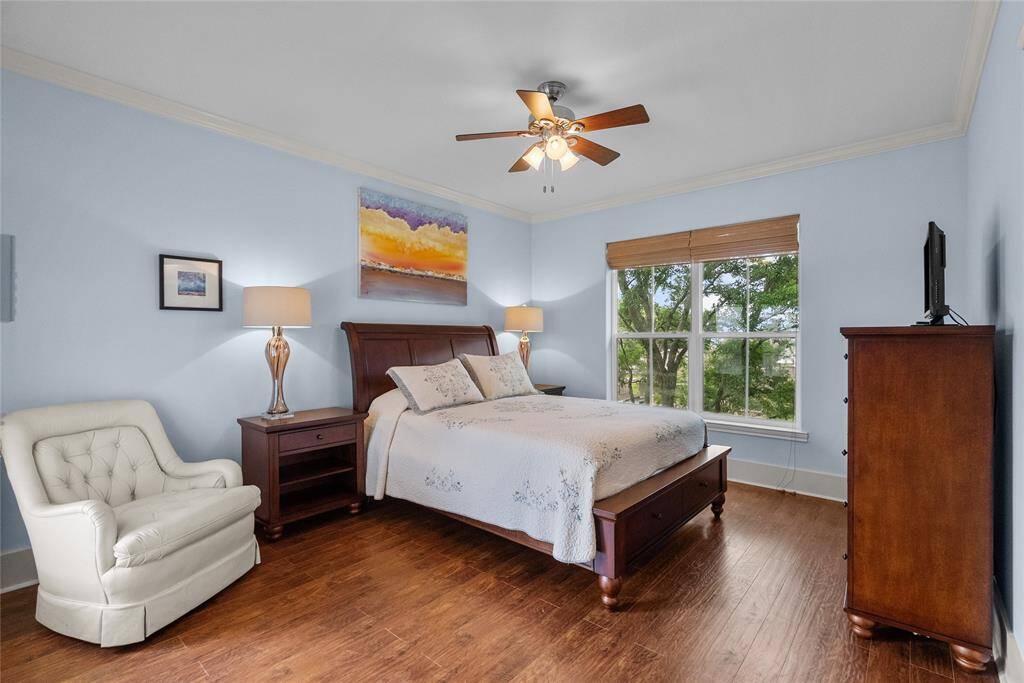 PRIMARY SUITE WITH ENSUITE BATH AND PRIVATE ENTRANE TO THE DECK