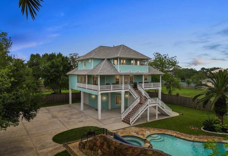 THIS HOME WOULD ALSO MAKE A GREAT SHORT-TERM RENTAL WITH 6 BEDROOMS ALL WITH THEIR OWN BATH, POOL, AND ELEVATOR AND WITH PLENTY OF ROOM TO BUILD AN ADDTIONAL HOME OR GUEST COTTAGE