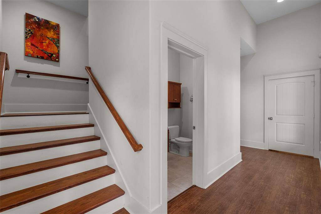 DOWNSTAIRS ENTRANCE WITH BATH A GREAT STORAGE AREA AS WELL AS THE ELEVATOR ENTRANCE