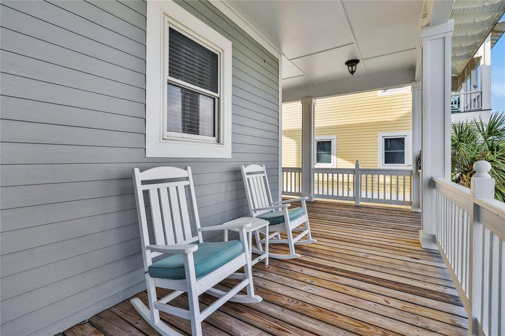 Front porch facing the bay side waters. Porch wraps around to the side with more view options.