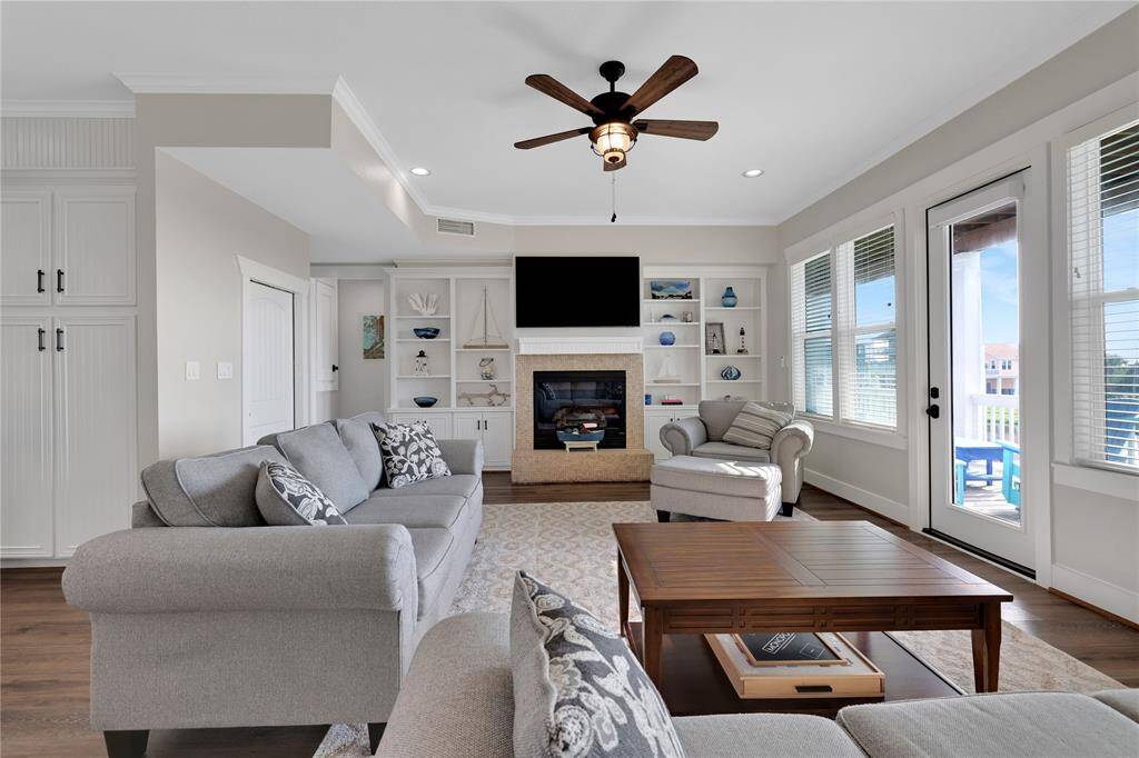 This cozy living room has plenty of seating and offers a cozy fireplace on those cool nights.