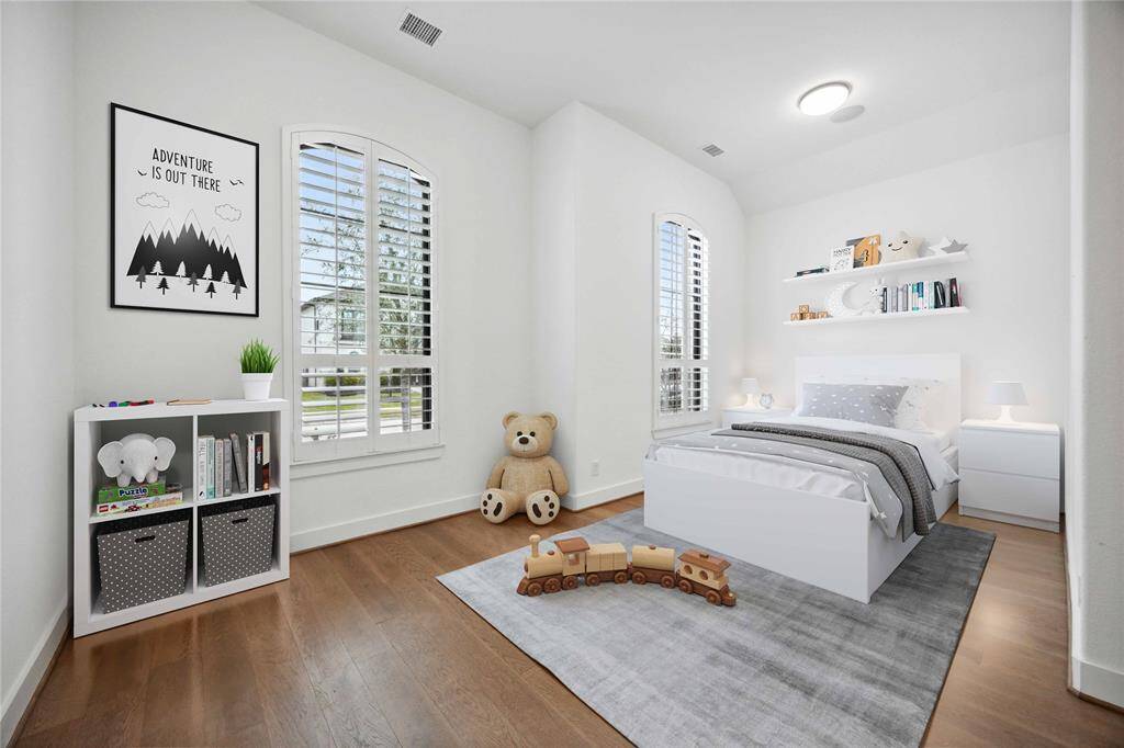 Virtually staged spacious secondary bedroom
