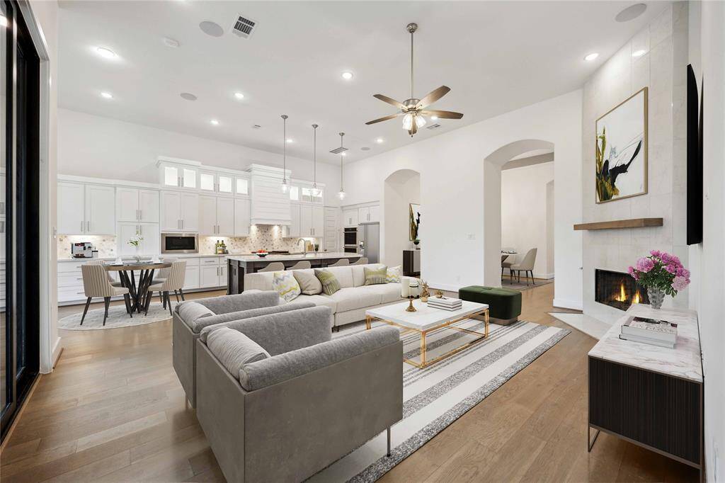 Virtually staged living room with fireplace