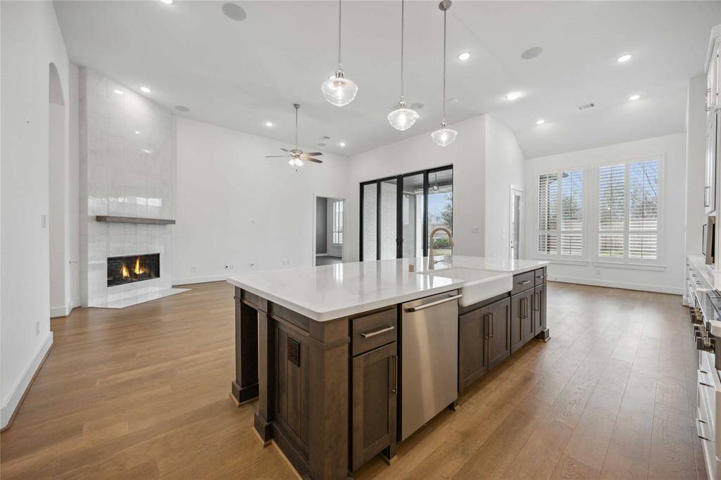 Open concept kitchen, living and dining.
