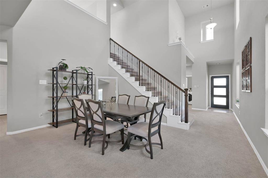 Natural light streams through the windows, enhancing the airy feel.