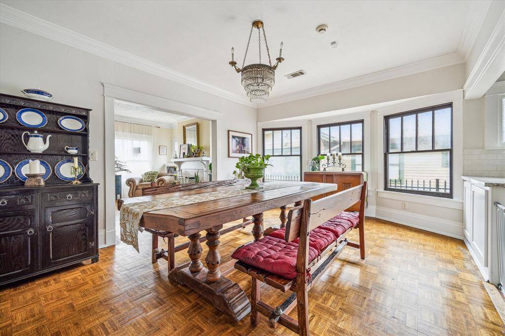 The dining room is approximately 16' x 12' with beautiful floors and high ceilings.