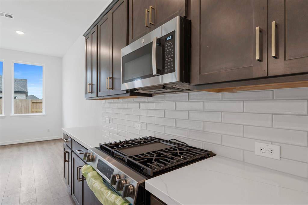 This kitchen is not only a functional space but also has ample storage. Whether you're a seasoned chef or just love to gather and enjoy good food, this kitchen is a dream come true.