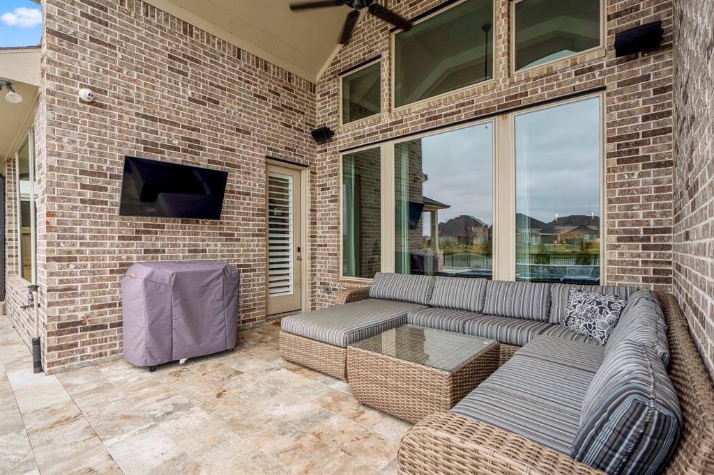 The covered patio is perfect for your outdoor living space, patio furniture, BBQ pit, and so much more! It connects to the main living areas, making it easy for indoor-outdoor living.