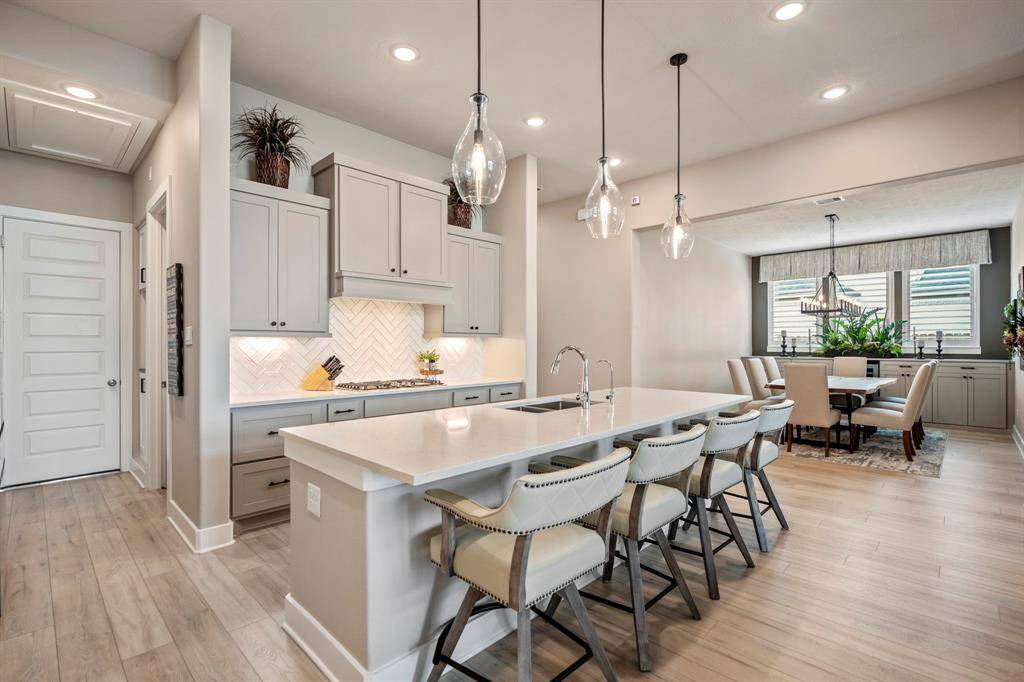 Your family and guests will enjoy many nights of fun, food and entertainment with ample counter space and kitchen island for setting up a wonderful array of provisions!