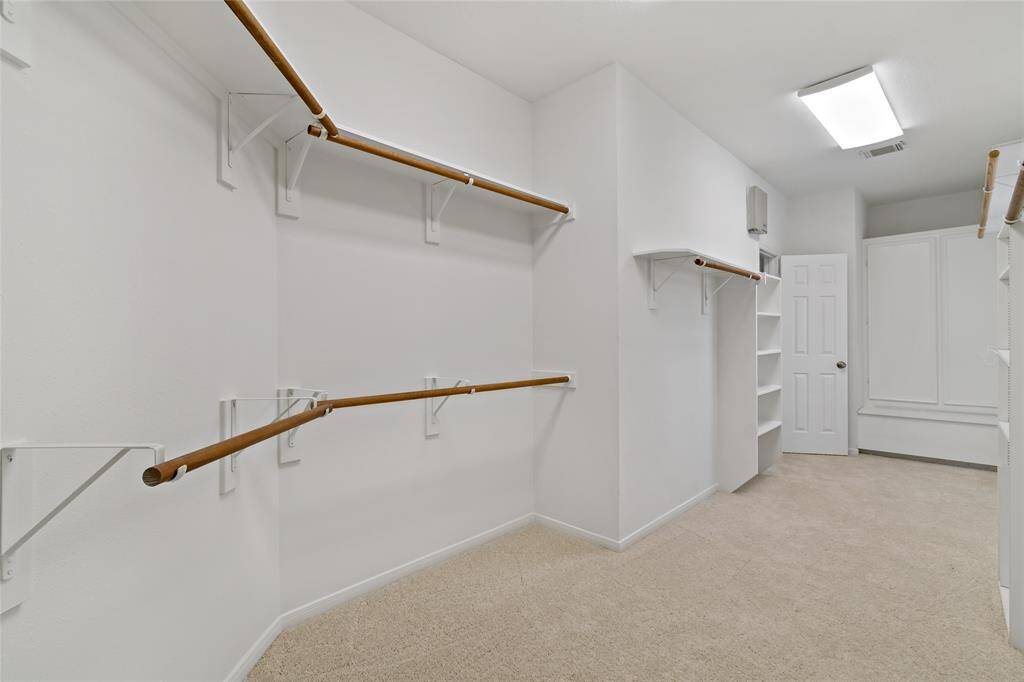Spacious Walk-In Closet for All Your Storage Needs!