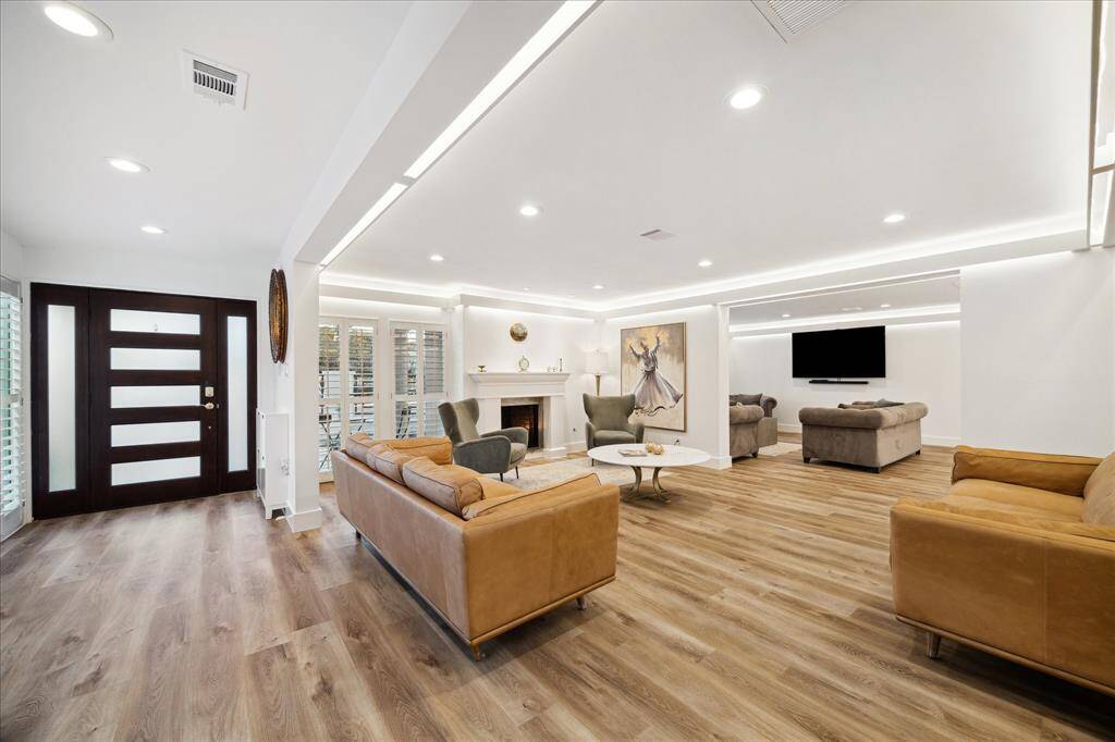 This thoughtful floor plan offers seamless connectivity between the family room, elegant den, and spacious dining area, creating an inviting atmosphere perfect for both formal and casual gatherings.