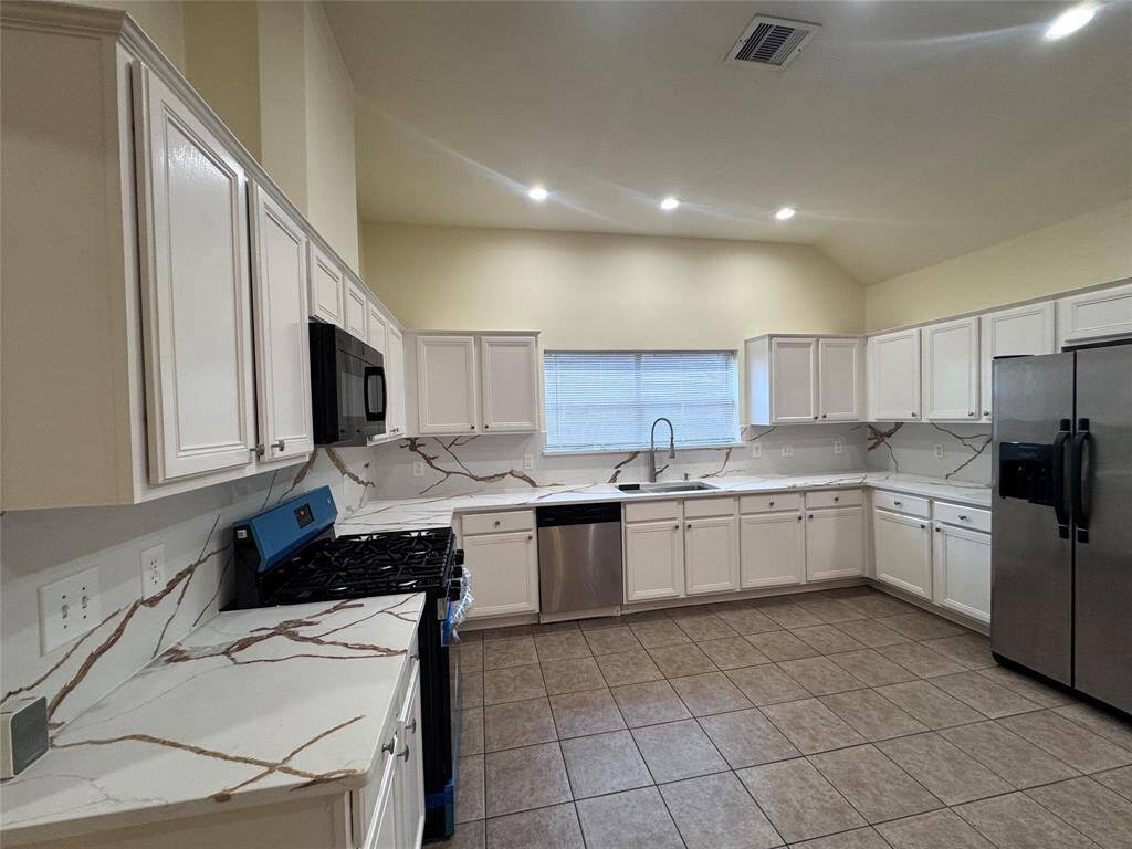 New countertops, sink, and stove with recess lightings for a relaxing evening with family