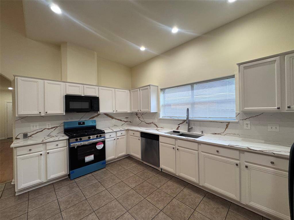New countertops, sink, and stove with recess lightings for a relaxing evening with family