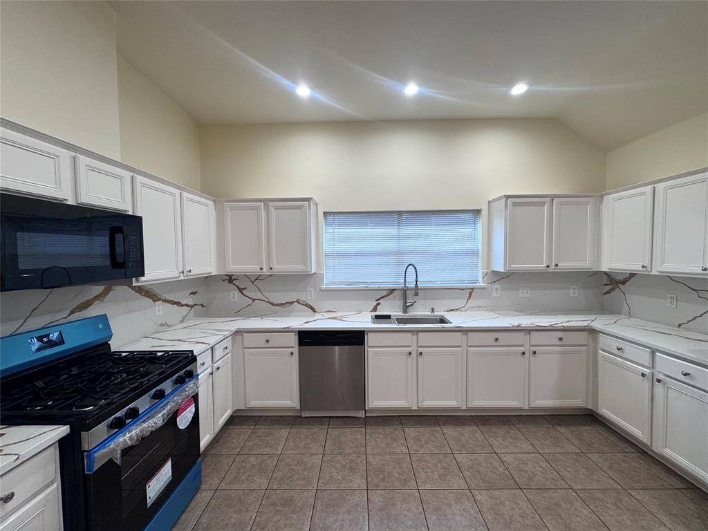 New countertops, sink, and stove with recess lightings for a relaxing evening with family