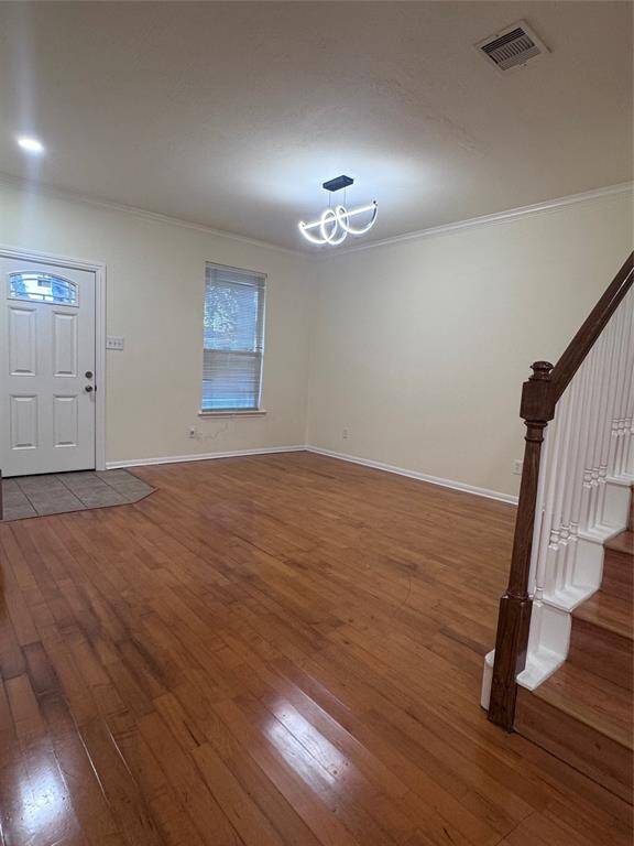 Dining room with updated fixture and fresh paint