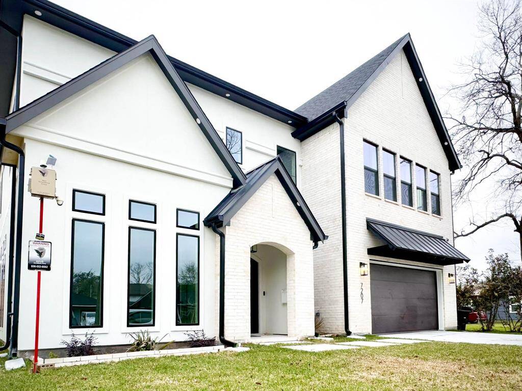 Stucco and brick at front elevation