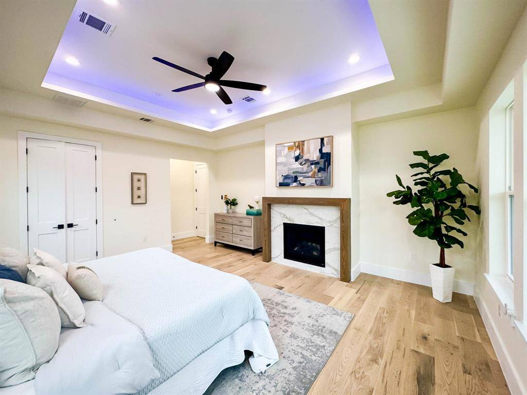 Wood flooring inside master bedroom