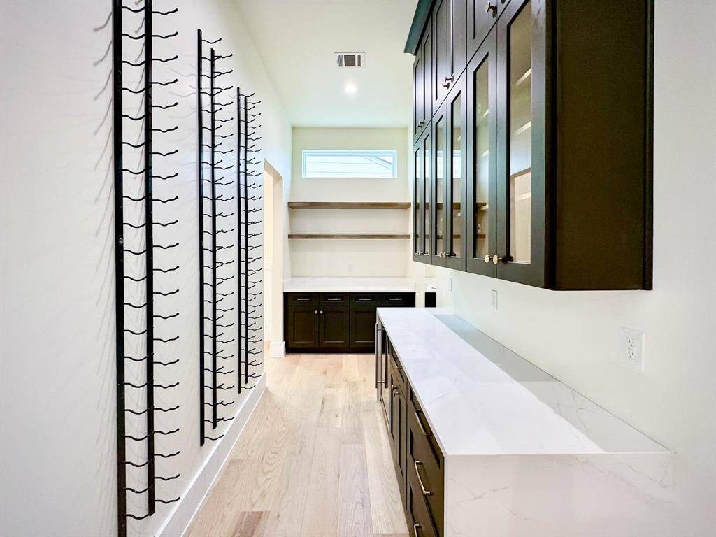 Wine room with Thermador wine cooler
